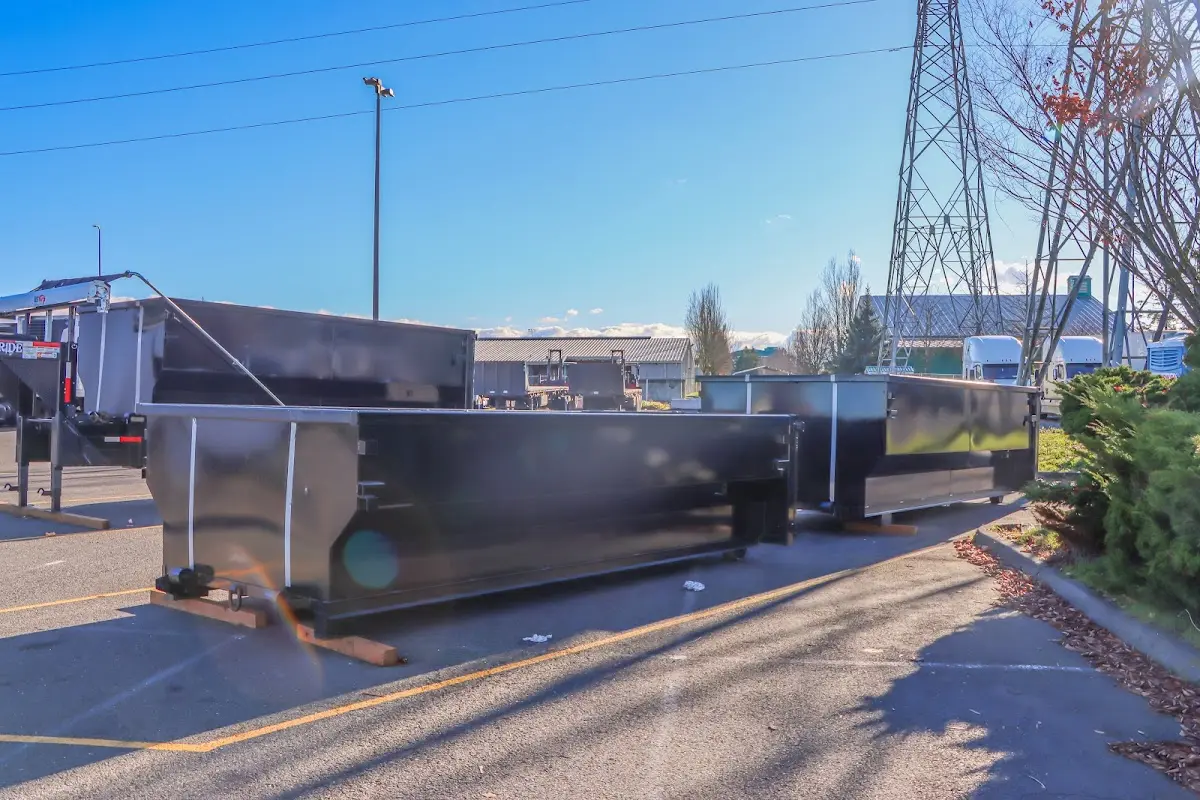 Roll-off dumpster ready for waste disposal at job site for Yard Waste Dumpster Rental in Huron